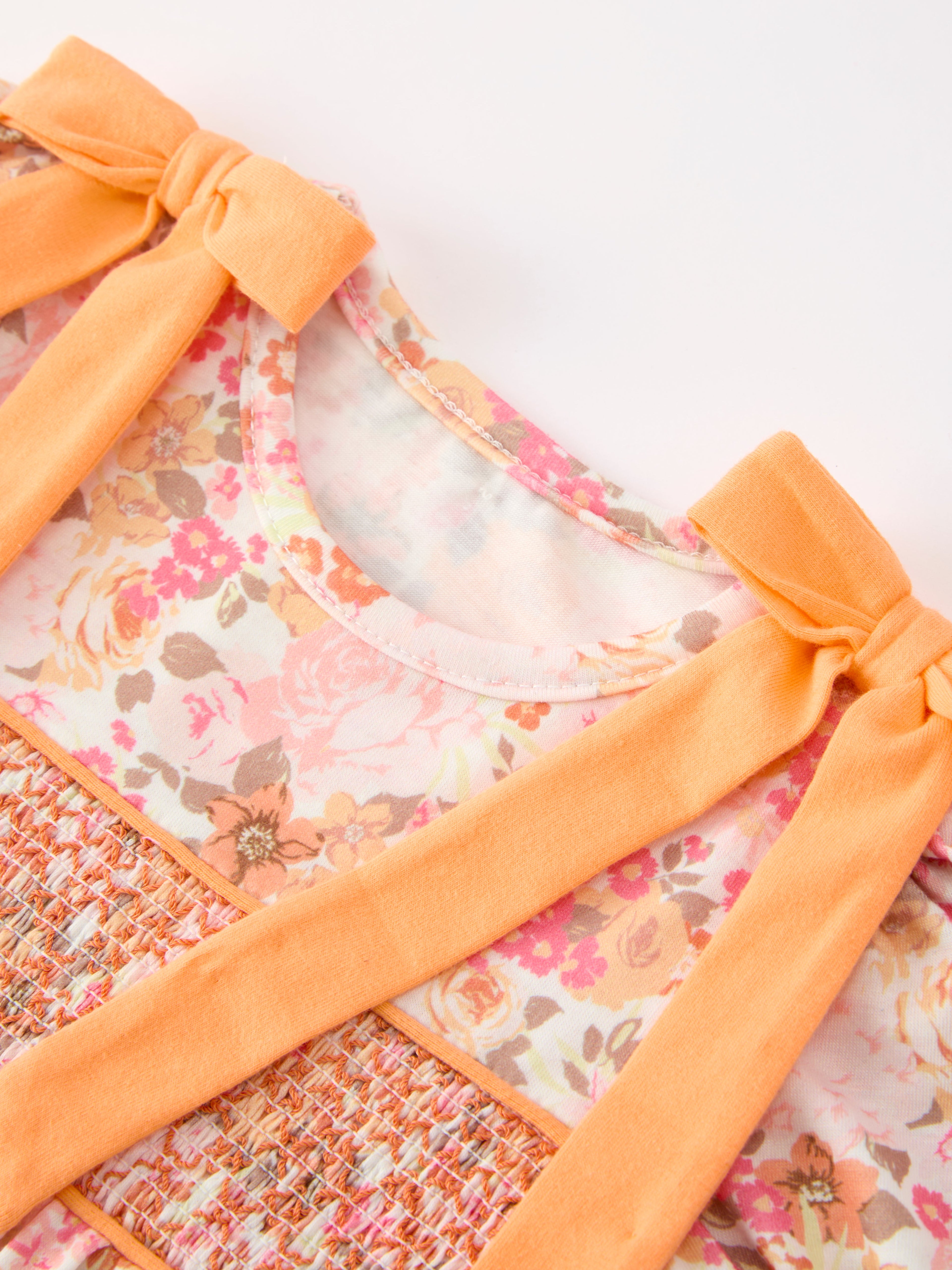 Peach Bow Smocked Floral Baby Bubble