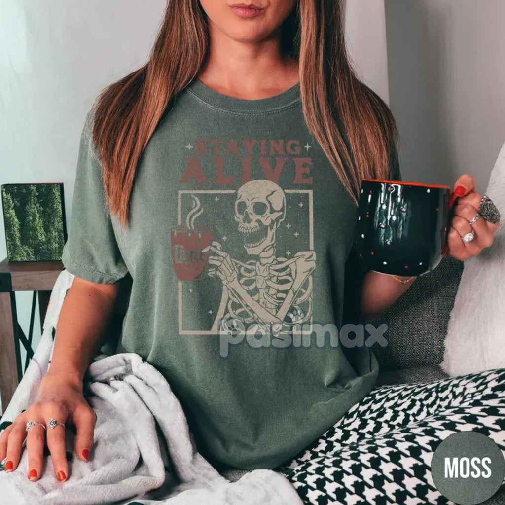 'Staying Alive' Coffee Shirt – Skeleton Retro T-shirt, Funny Coffee Lovers Gift, Daily Grind Tee, Women's Comfort Colors Apparel