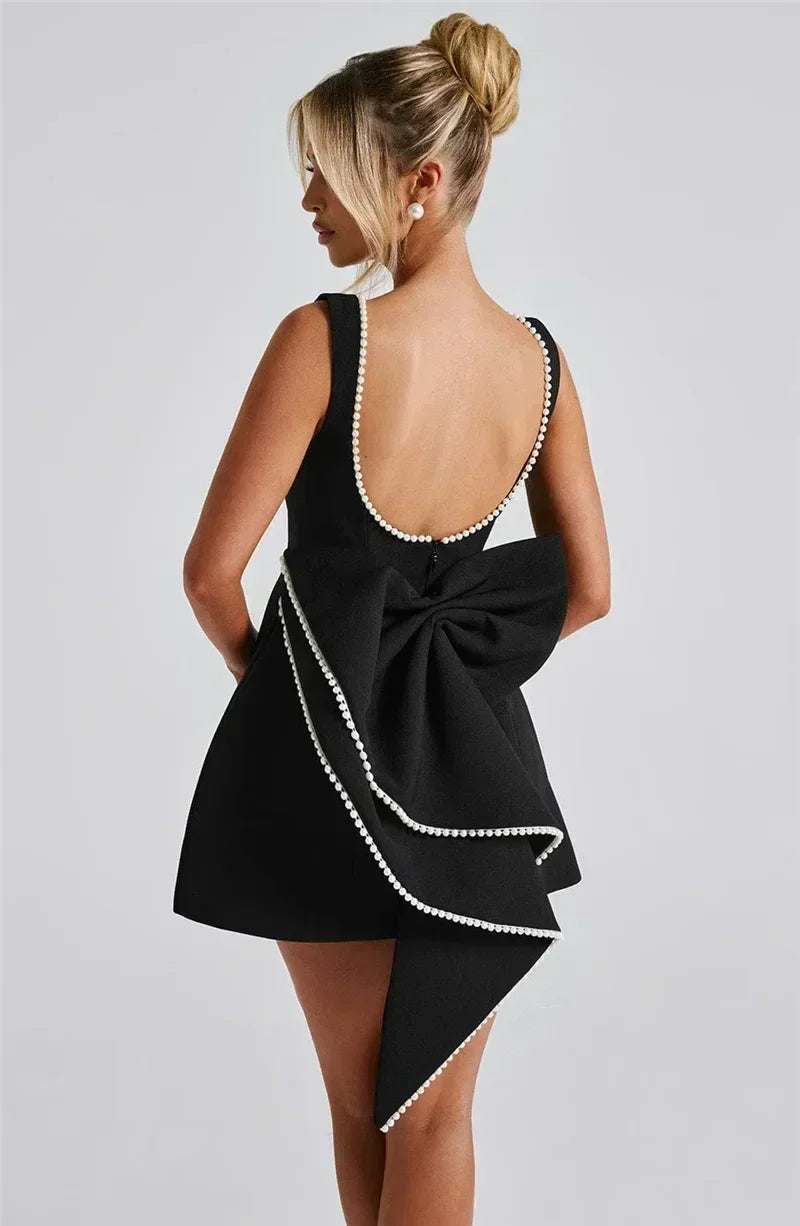 Mozision Pearl Bow Backless Sexy Mini Dress For Women Robe Fashion Zipper Sleeveless High Waist A-line Club Party Dress Elegant