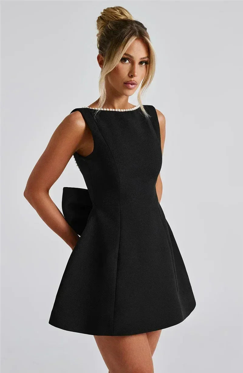 Mozision Pearl Bow Backless Sexy Mini Dress For Women Robe Fashion Zipper Sleeveless High Waist A-line Club Party Dress Elegant