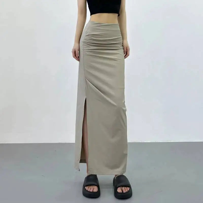 2026 New Pleated Side High Slit Half Length Skirt Women's Summer Spicy Girl Pure Desire Slim Wrap Hip Solid A-line Skirt 7MHN
