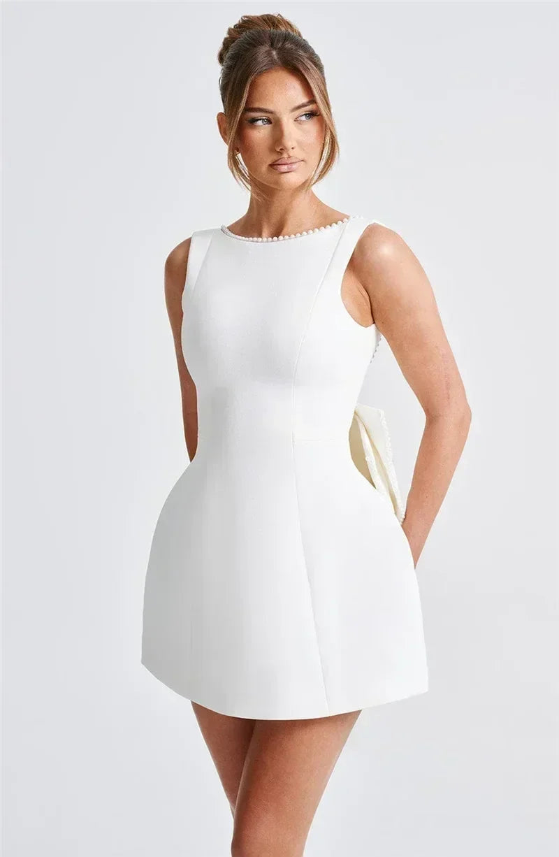 Mozision Pearl Bow Backless Sexy Mini Dress For Women Robe Fashion Zipper Sleeveless High Waist A-line Club Party Dress Elegant